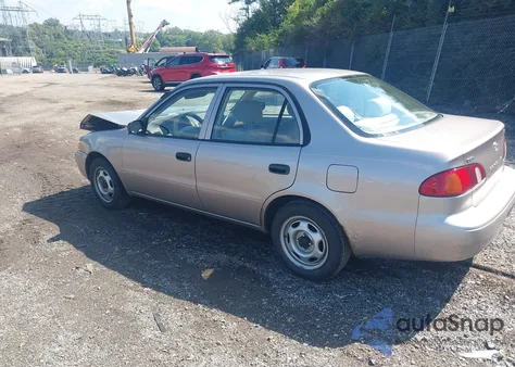 1999 Toyota Corolla Ve z USA, uszkodzony, nr VIN 2T1BR12E7XC141015
